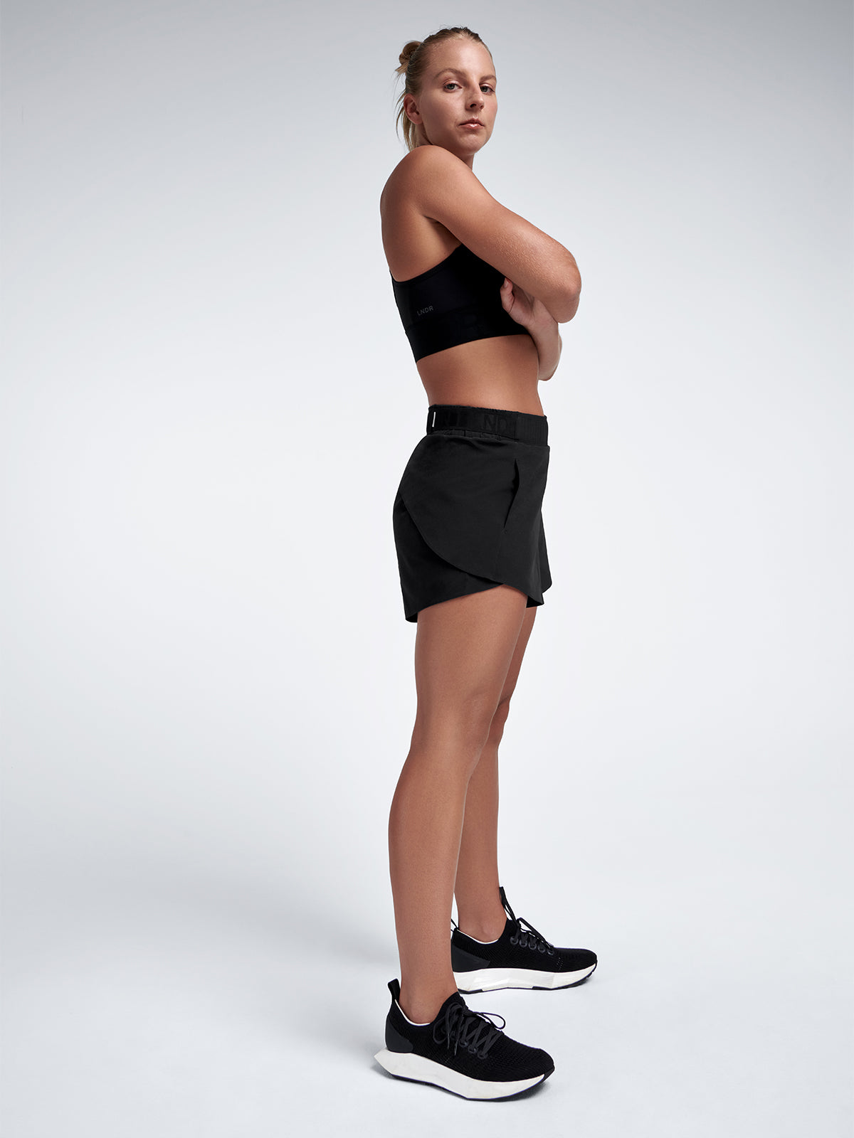 Womens fly recycled black run short 1