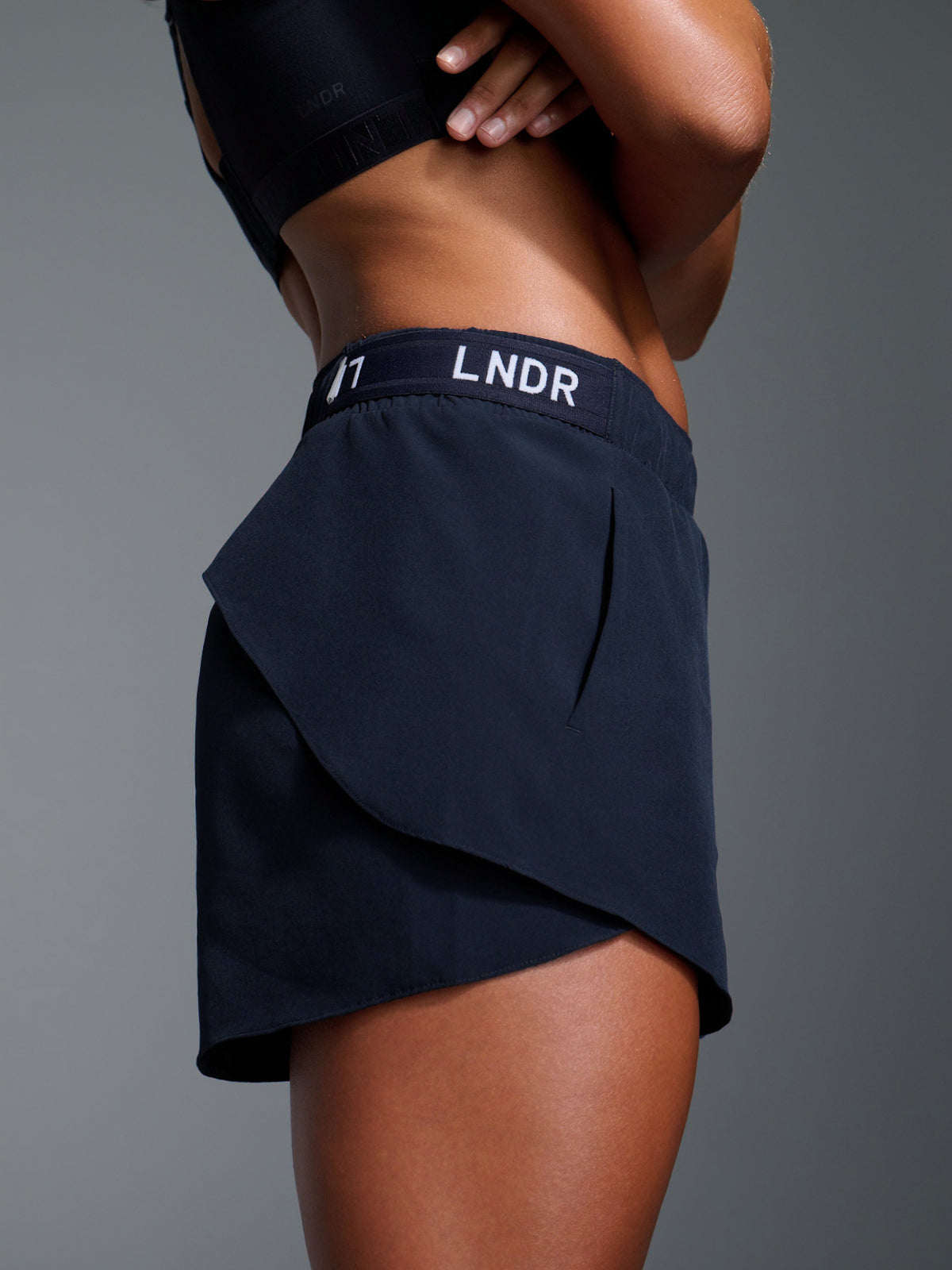 Womens fly recycled deep navy blue run short 1