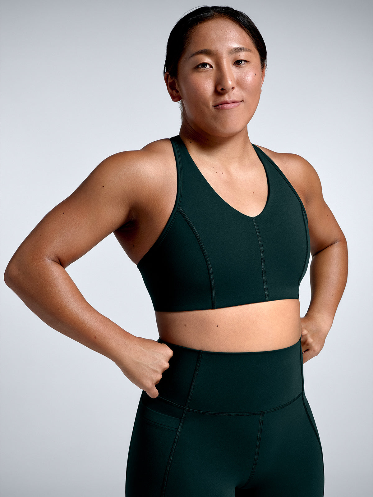 Womens femme fatale dark green sports bra 1